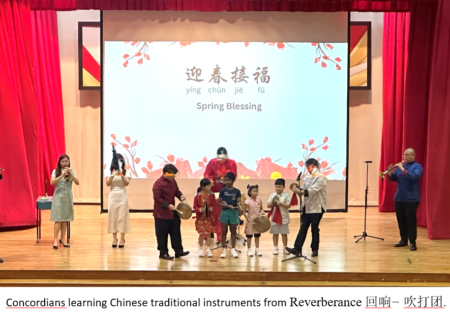 Concordians learning chinese traditional instruments from Reverberance.